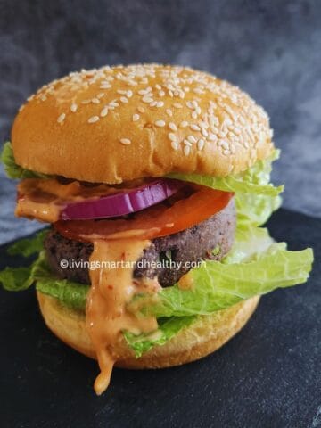 Black bean burger patties in air fryer basket